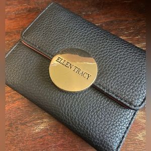 Ellen Tracy black leather exterior maroon leather interior pocket/purse wallet